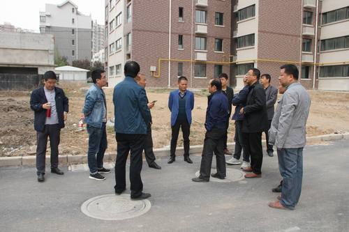 銅煤公司承建的銅煤2#小區水仙居5、6、7、8#樓順利通過竣工驗收