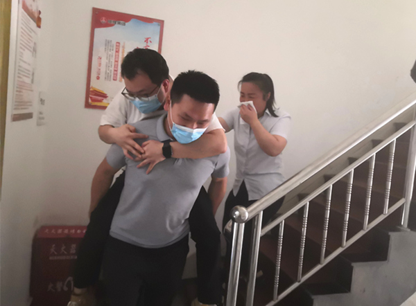 陜煤建設礦建三公司機關開展消防逃生演練活動