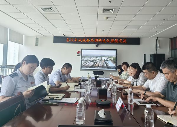 秦漢新城稅務局黨委委員、副局長劉明俊一行到陜煤建設天工公司走訪座談